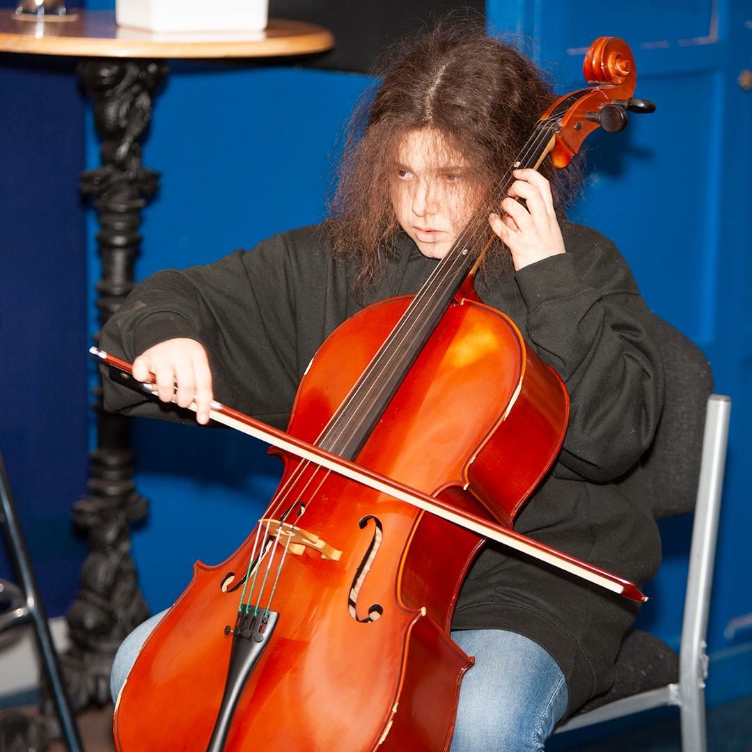 Young woman playing cello
